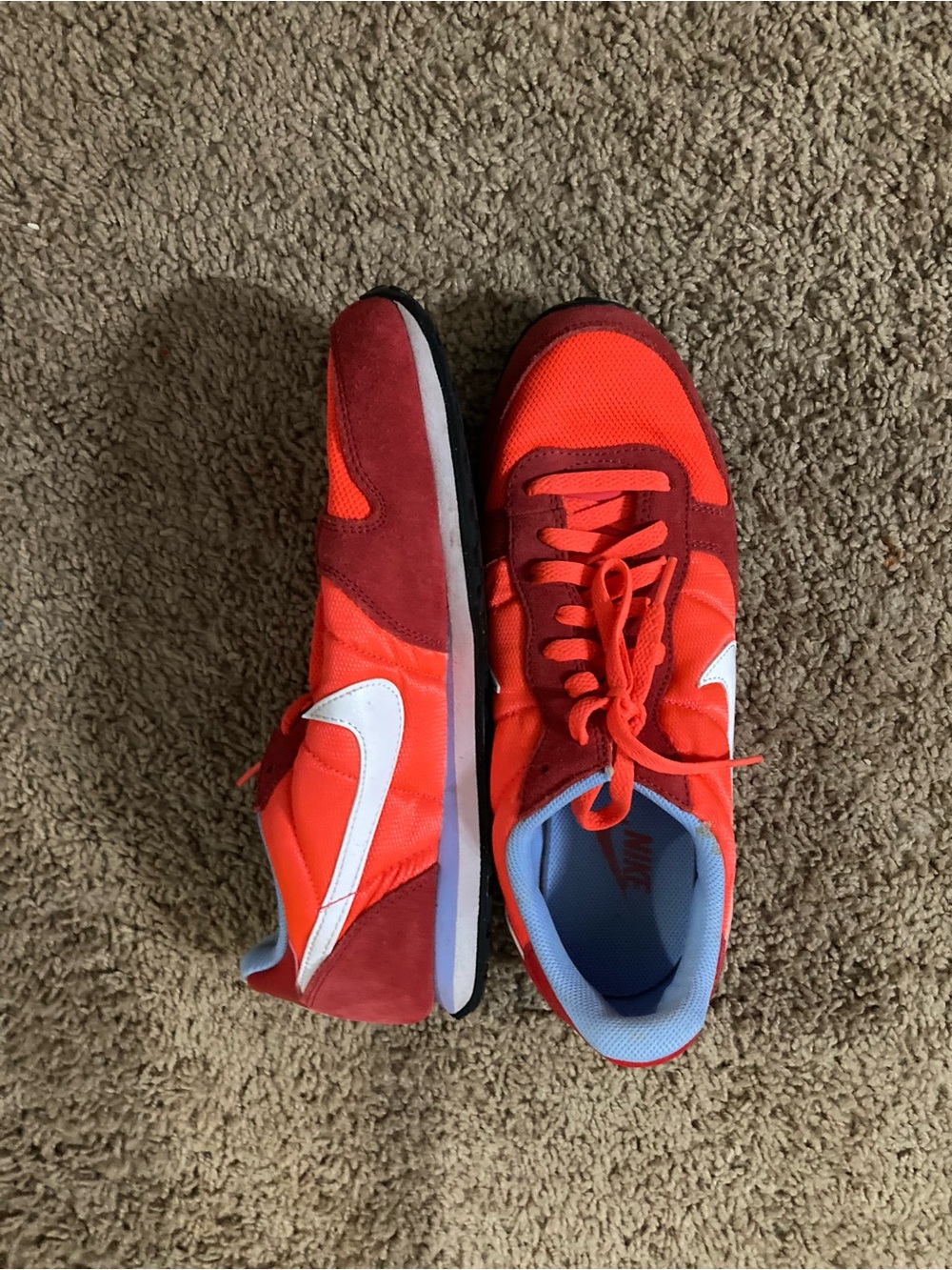 Nike Genicco in the red/orange colorway